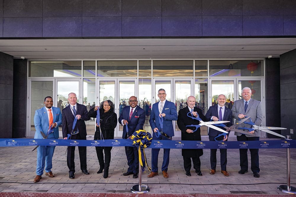 OPEN FOR BUSINESS The official ribbon cutting ceremony for the grand opening of the Rivers Casino, the first of its kind in Virginia. Portsmouth Economic Development Director Brian Donahue is pictured second from right. (Photo courtesy of The KBD Group, LLC)