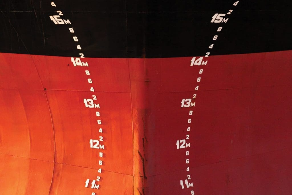 Bow of a tanker ship with depth indicators
