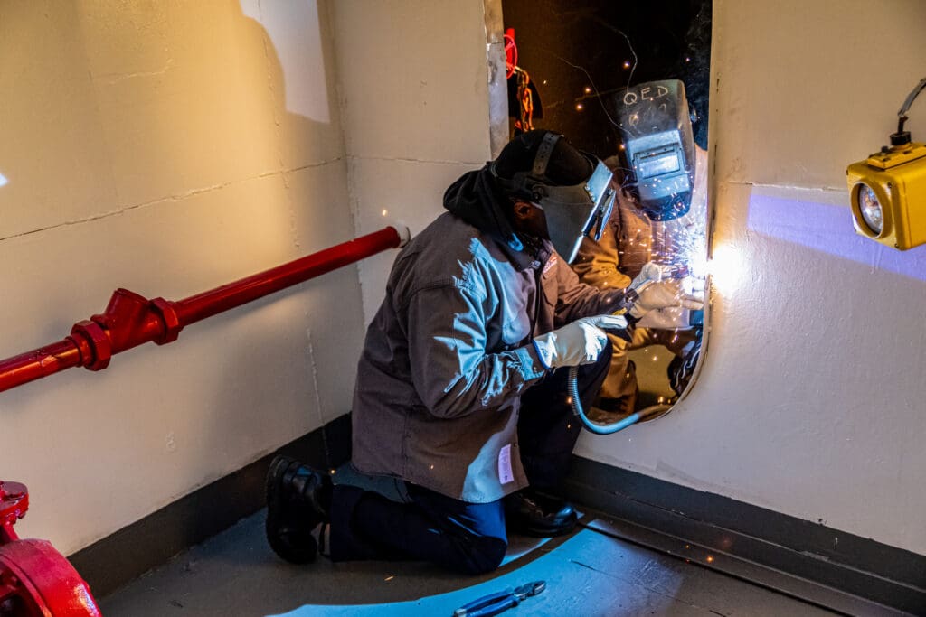 Photo of person learning to weld